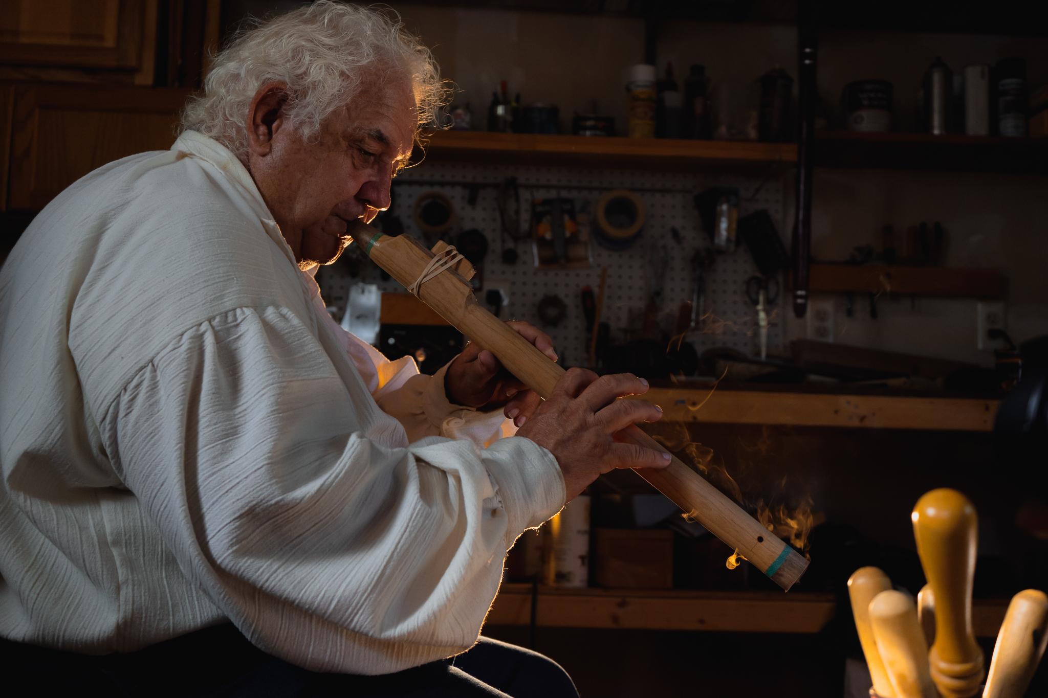 Tony Francis making a Native flute